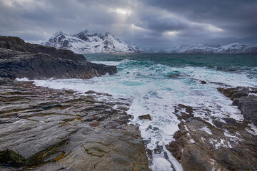Evening View of Dramatic Ocean Waves Hitting Stony Shore in The Evening.