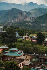 Factory emitting smoke in hilly Himachal Pradesh India