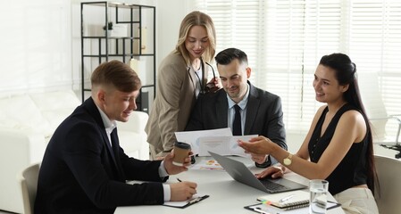 Marketing. Team of businesspeople working together at desk in office