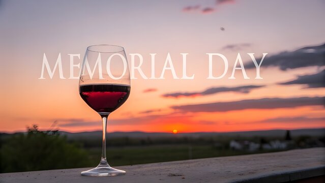 A reflective Memorial Day toast at sunset honoring heroes with a glass of wine under soft sunset light and peaceful