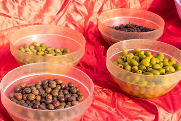Assorted olives and olives with various additives at the buffet in Turkey