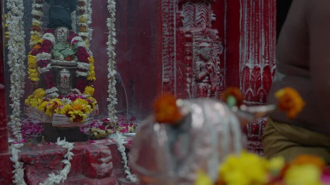 Varanasi, Uttar Pradesh, India-24th February 2025- Close high speed shot of a shiv ling in shiva temple of Varanasi in Uttar Pradesh.