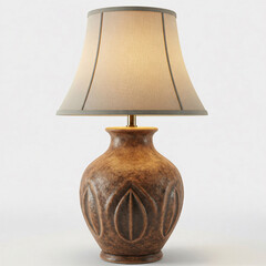 A modern table lamp with a textured brown base and a light-colored lampshade, emitting a warm, muted light