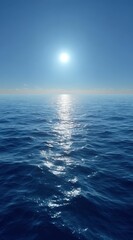 Obraz premium A vast deep blue ocean stretches endlessly under a radiant sun, illuminating the water's surface with a shimmering glow. Gentle waves create a calming atmosphere