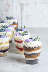 Trifles, assortment of 4 flavors: red velvet with raspberries, chocolate with caramel, vanilla with...