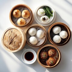 Assortment of dim sum in bamboo steamers and a white bowl on a white surface viewed from above