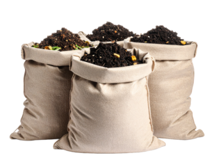 Three burlap sacks filled with compost soil on white backdrop