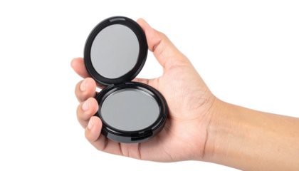 Hand gripping sleek black compact mirror, revealing pristine reflection, against transparent backdrop