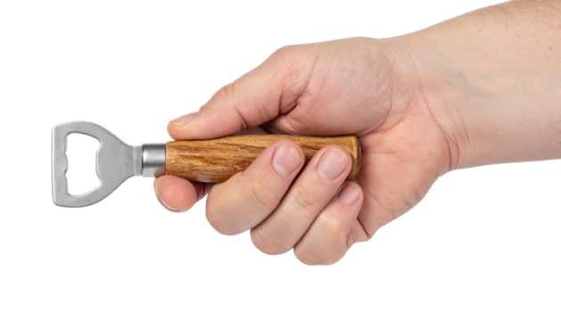 Caucasian bartender gripping metal bottle opener with wooden handle, standing against transparent background
