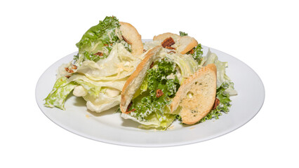 Classic Caesar Salad with Romaine Lettuce, Croutons, and Creamy Dressing on White Plate