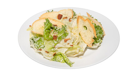 Classic Caesar Salad with Romaine Lettuce, Croutons, and Creamy Dressing on White Plate