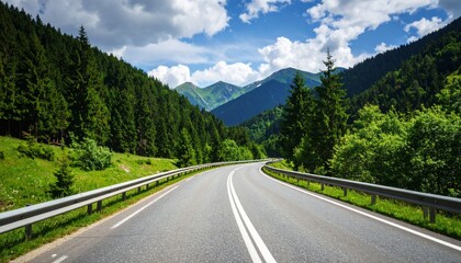 Naklejka premium Winding road leads through green mountains. Scenic nature landscape, journey.