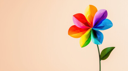 Colorful pinwheel flower with vibrant petals against soft background, creating cheerful and playful atmosphere