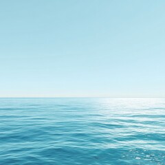 Obraz premium Calm, light blue ocean meets a pale sky