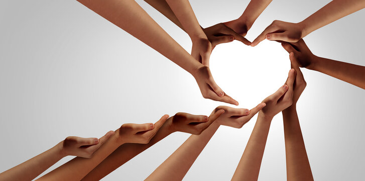 Unity And Togetherness partnership as heart hands in a group of diverse people connected together shaped as a support symbol expressing the feeling of teamwork and belonging or inclusion.