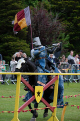 Knght Jousting Tournament. Knight in medieval armour on a horse. 