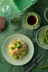 Delicious grilled fish fillet with broccoli and couscous enjoying a healthy meal