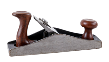 Vintage metal hand planer with wooden handles isolated on white background used for woodworking and surface smoothing