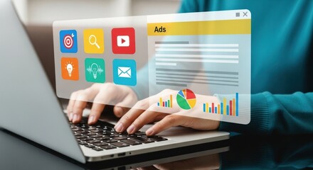 Person typing on laptop with ads interface overlay displaying marketing and analytics icons and charts