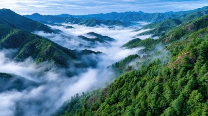 The sunrise over the misty mountains of Shangri-La in China is an enchanting sight, with clouds rolling across the peaks and creating an ethereal atmosphere that gives it its signature beauty