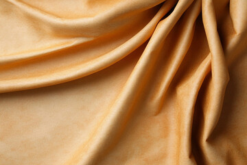 Gorgeous burnt orange parchment-like texture with natural folds under soft light
