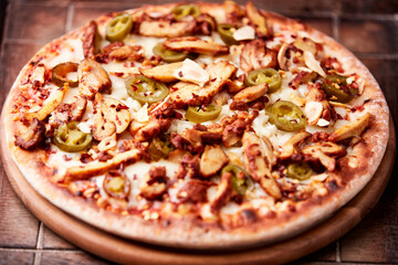 Gyros Pizza with jalapeno pepper and mozzarella cheese. Soft focus. Close up.	