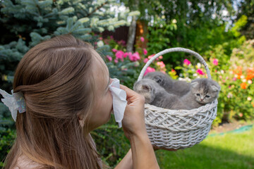 Woman Sneezing from Cat Allergy in Garden