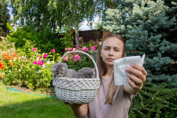 Woman Sneezing from Cat Allergy in Garden
