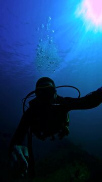 Scuba diver explores USAT Liberty Wreck Bali