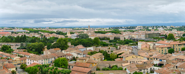 Panorama of Carcassonne ville basse which means lower city with its traditional orange handmade French roof tiles in Aude Occitanie Southern France.	