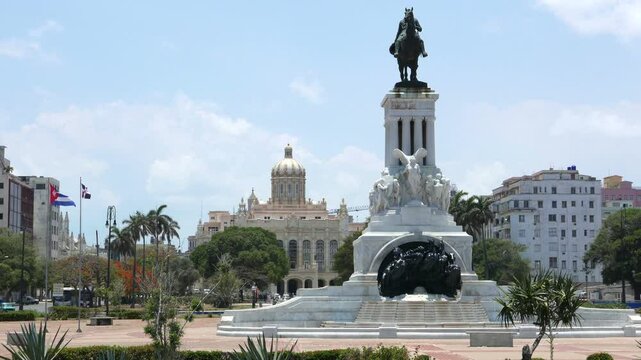 Statue of M&aacute;ximo G&oacute;mez in Parque Martires del 71, with the Museum of the Revolution in the background. Located in Havana, Cuba. 2016.
