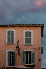 Charming European facade at dusk.