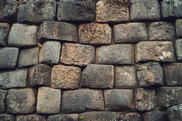 Fototapeta premium Close-up of rough stone wall texture in black and white. AI generative