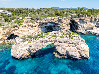 Natural arch Es Pontas near Cala Santanyi on Mallorca island in the Mediterranean sea in Spain