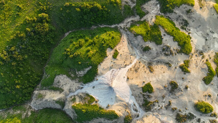 Buzău's Boiling Mud Volcanoes. 
This photo provides a glimpse into this extraordinary geological...