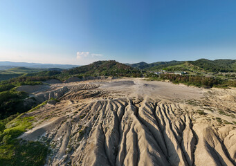 Buzău's Boiling Mud Volcanoes. 
This photo provides a glimpse into this extraordinary geological phenomenon, where the Earth seems to be constantly in motion.