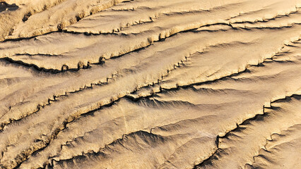 Buzău's Boiling Mud Volcanoes. 
This photo provides a glimpse into this extraordinary geological phenomenon, where the Earth seems to be constantly in motion.
