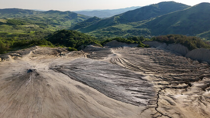 Buzău's Boiling Mud Volcanoes. 
This photo provides a glimpse into this extraordinary geological phenomenon, where the Earth seems to be constantly in motion.