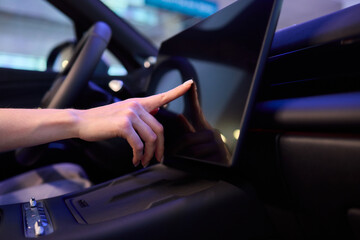 A modern car interior with advanced touchscreen controls enhances user experience and convenience