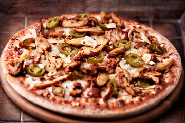Gyros Pizza with jalapeno pepper and mozzarella cheese. Soft focus. Close up.	