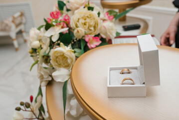 Wedding Rings And White Roses