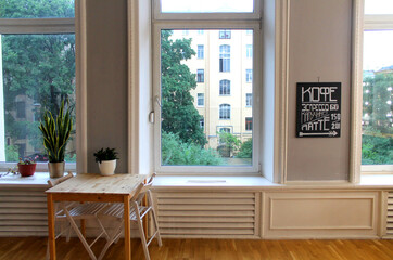 interior of the house with the large white windows