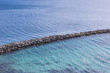 Stone Breakwater in Turquoise Mediterranean Waters