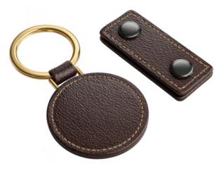 Brown leather keychain with detachable snap tab isolated on transparent background