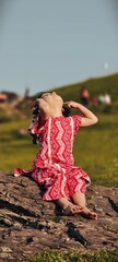 young baby in red dress