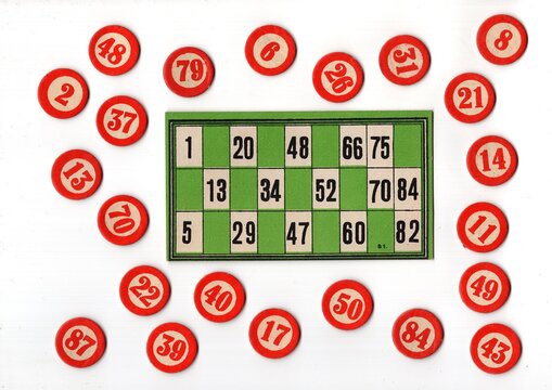 A vintage lotto card with numbered counters on a white background.