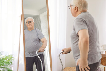 Senior old man, pleasant grandfather elderly person retired patient standing looking in full length...