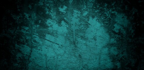 A textured background featuring a deep teal color with a distressed, grunge appearance. The surface shows variations in tone and subtle patterns, creating an abstract and moody aesthetic.
