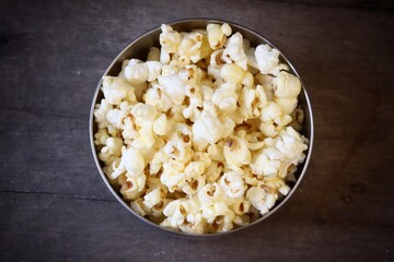 Pop corn on wood background