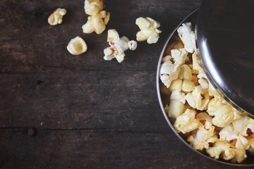 Pop corn on wood background